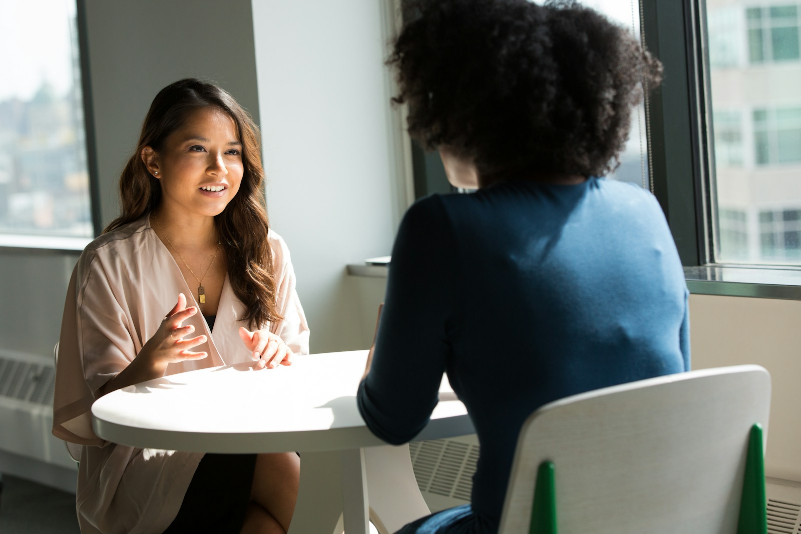 An advisor listening carefully to a customer