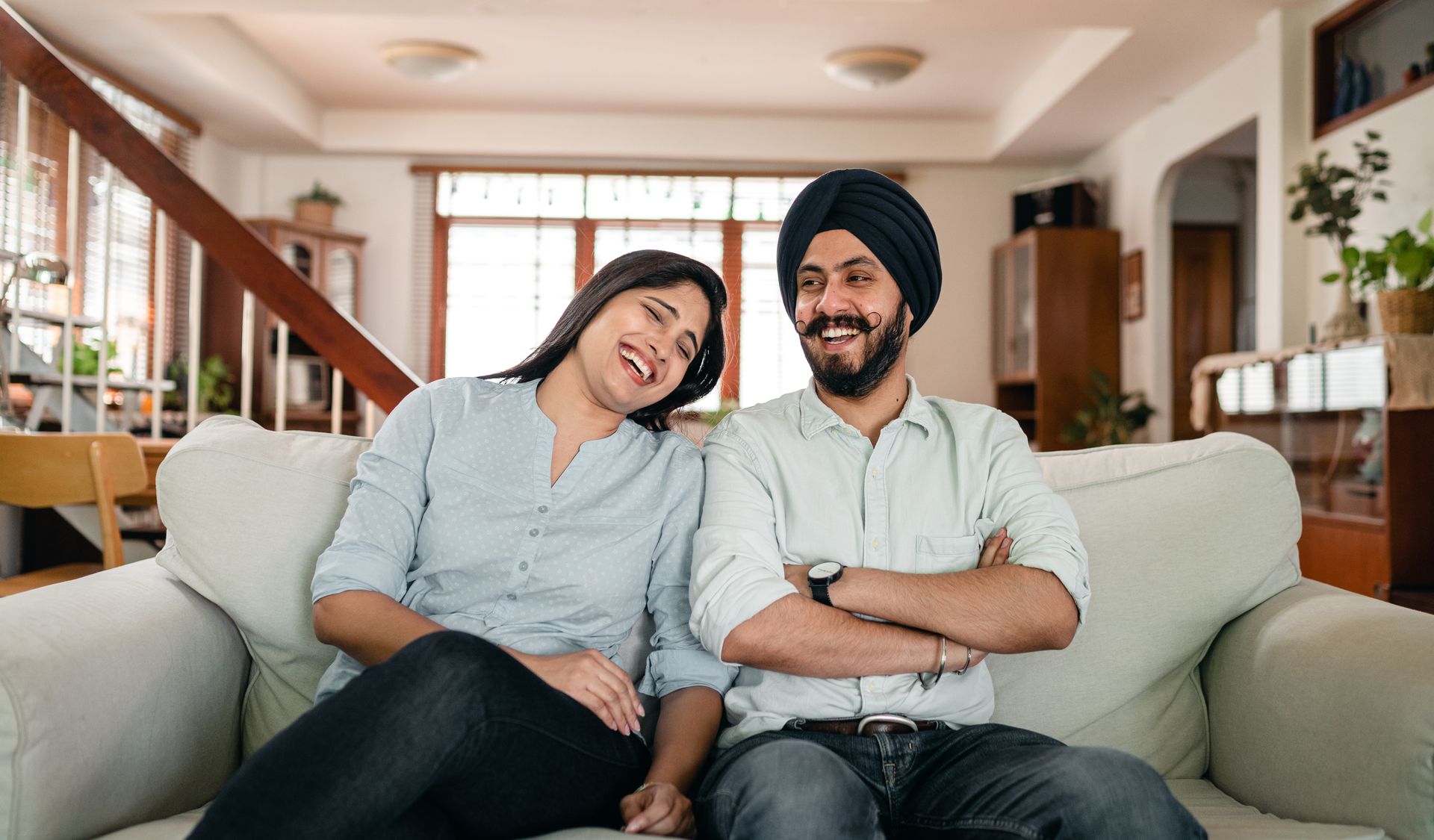 An Indian couple sharing a relaxed moment together at home